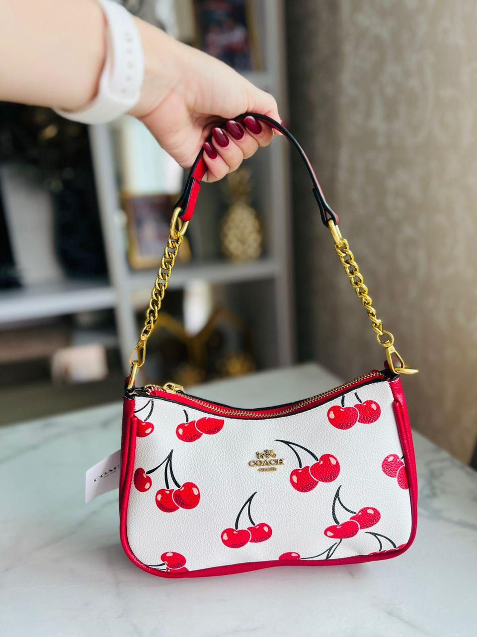 BOLSO COACH TOP