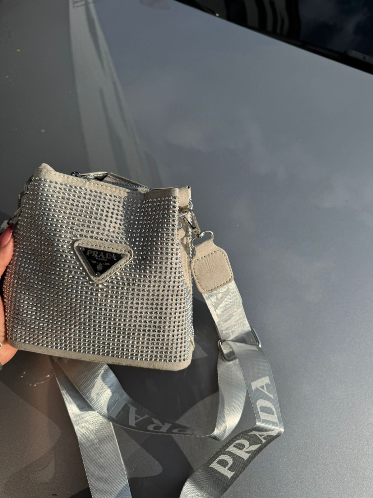PRADA BRILLOS