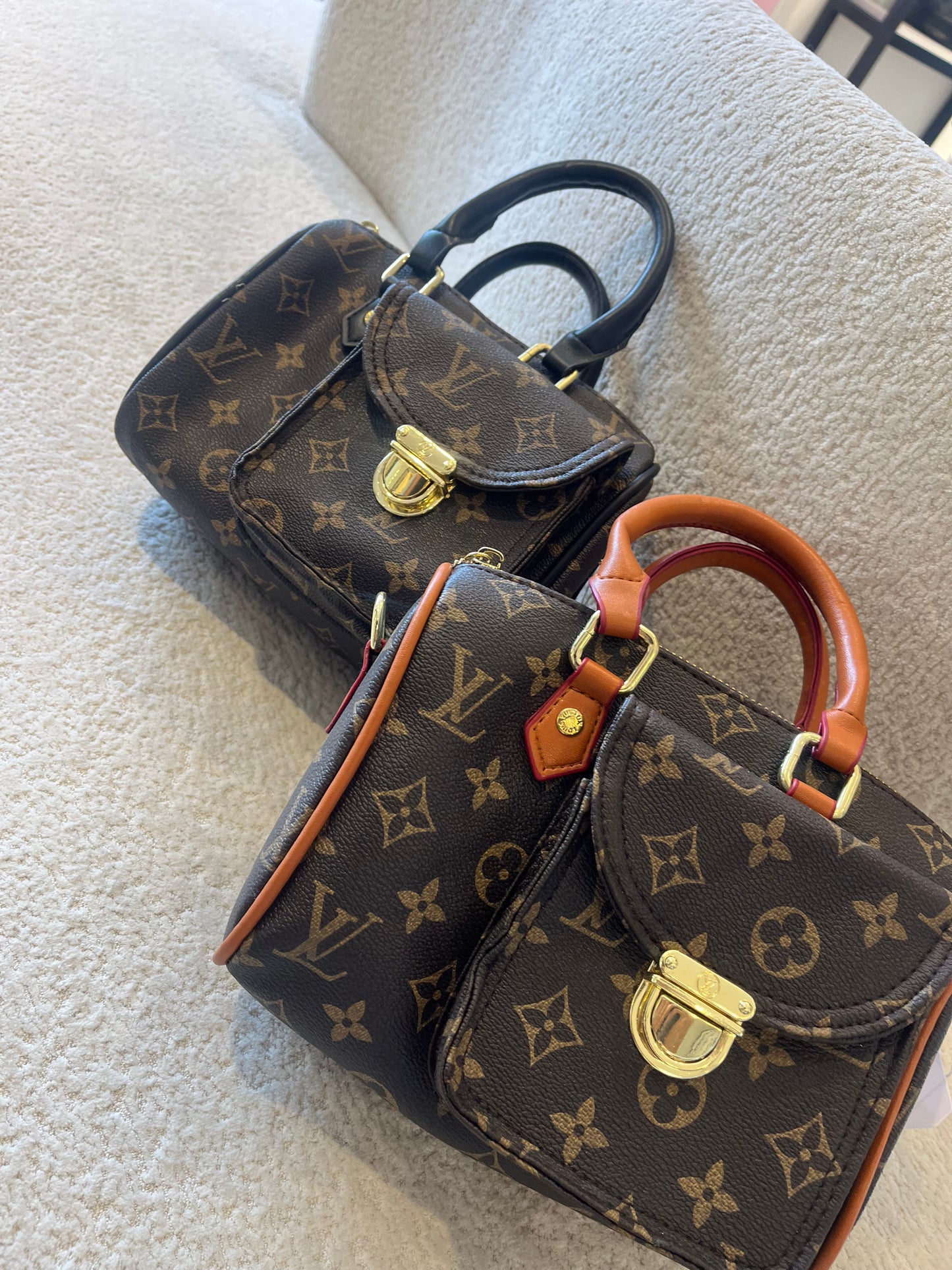 BOLSO BAÚL LV CON BOLSILLO