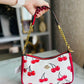 BOLSO COACH TOP