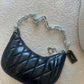 BOLSO COACH BLANCO Y NEGRO