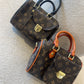 BOLSO BAÚL LV CON BOLSILLO